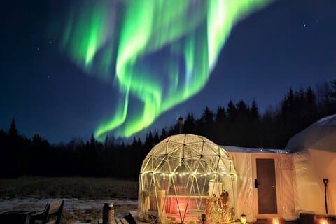 Sleep in a Glass Igloo Under Northern Lights