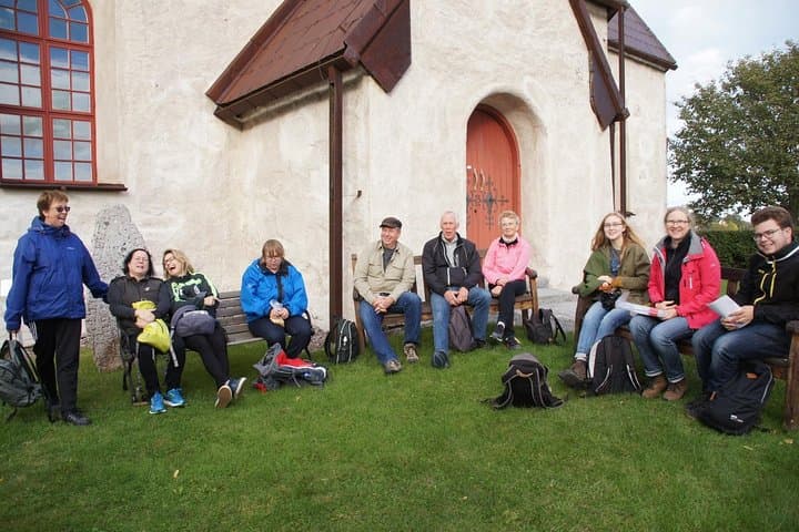Orkesta church outside with group