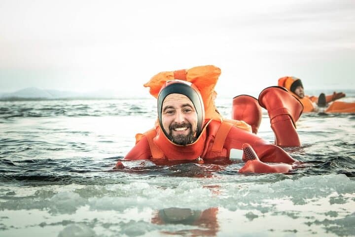 Floating in the icy water in Polar Explorer Icebreaker cruise