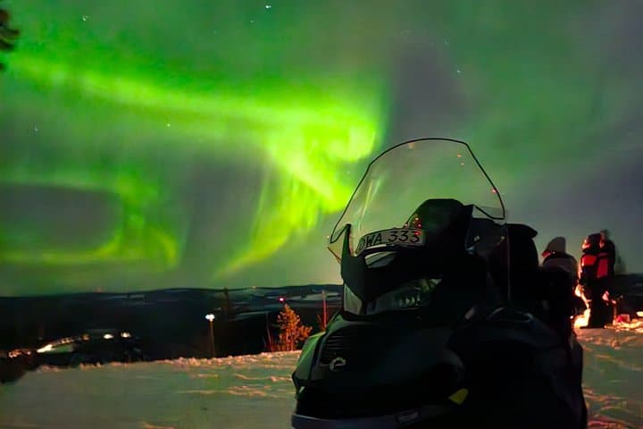 Hunt for the Northern Lights on Snowmobile