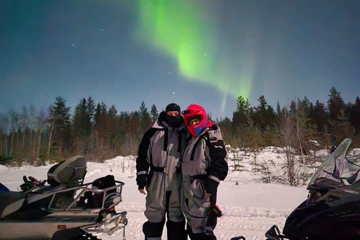 Hunt for the Northern Lights on Snowmobile