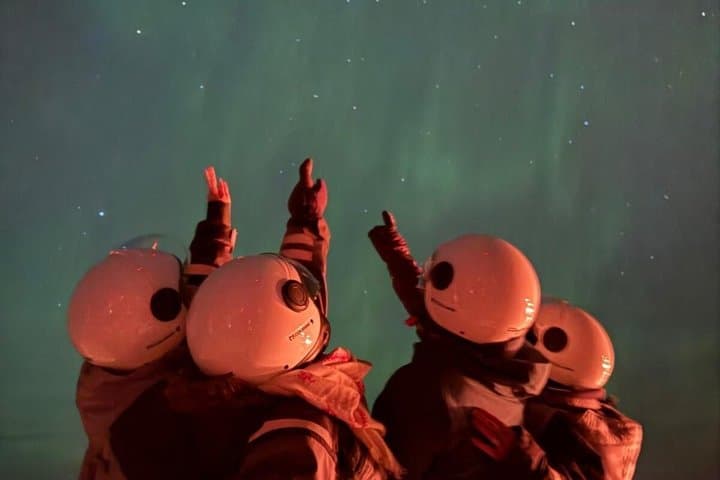 Hunt for the Northern Lights on Snowmobile