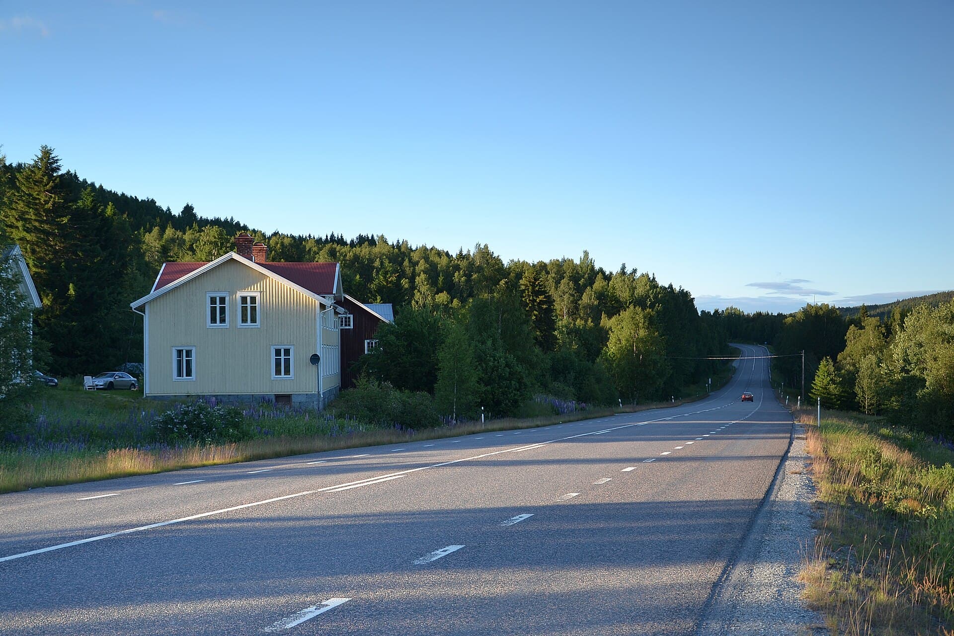The E4 through the High Coast near Docksta, forest and mountains along the road north